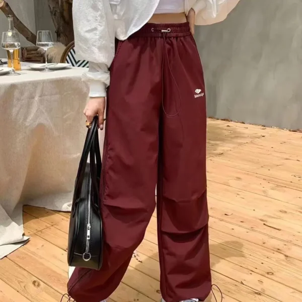 Balenciaga Embroidered Striped Drawstring Wide-Leg Pants