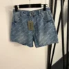 Balenciaga Denim All-Over Print Logo Shorts