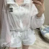 Chanel Cutout Embroidered Drawstring Jacket and Shorts Set