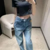 Louis Vuitton Denim High-Waist Logo Jeans