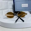 Gucci Oval Metal Sunglasses