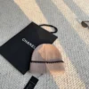 Chanel Ribbed Knitted Beanie with Black Contrast Stitching and CC Embroidery