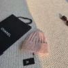 Chanel Melange Ribbed Cuffed Beanie with Raised Tonal Logo Embroidery