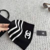 Chanel Black and White Striped Knitted Beanie with Raised CC Embroidery - Ref. HTCHANEL0009