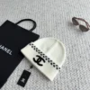 Chanel Knitted Beanie with Decorative Scalloped Edge and Raised CC Logo - Ref. HTCHANEL0013