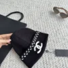Chanel Knitted Beanie with Decorative Scalloped Edge and Raised CC Logo - Ref. HTCHANEL0015