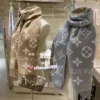 Louis Vuitton Reversible 100% Wool Monogram Scarf - 180 x 30 cm - Ref. SCCOACH0010